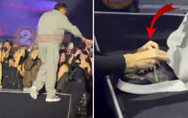 Səhnədə pərəstişkarına ayaqqabısını bağlatdırdı