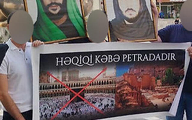 “28 Mall”un qarşısında plakat açan təriqət üzvləri həbs edildi 