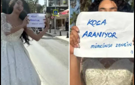 Gəlinlik geyinib əlində kağızla küçəyə çıxdı  "Varlı ər axtarıram"  VİDEO