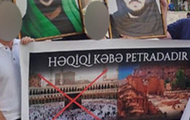 “28 Mall”un qarşısında plakat açan təriqət üzvləri həbs edildi 